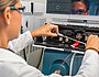  Employee works on analytical column and liquid chromatograph